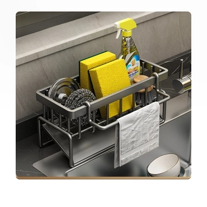 Detail of grey kitchen sink organizer with sponge basket, towel rack and drainage tray
