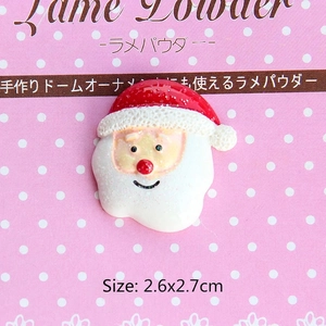 Detail of resin Santa Claus charm with red glitter hat and white beard, size 2.6x2.7cm