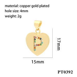 Macro view of 18K gold plated heart pendant with colorful cubic zirconia letter P detail