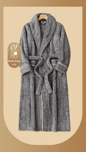 Detail of plush charcoal grey bathrobe with white piping and thick fleece texture