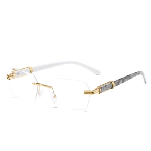 Frameless gold rimless sunglasses with marble texture temples and gradient lenses
