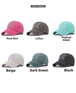 Detailed grid view showing six washed cotton baseball cap colors with cursive embroidery