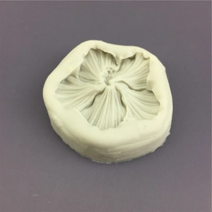 Detailed close-up of a hibiscus flower silicone mold with intricate petal texture
