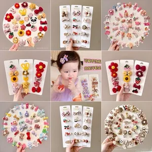 Detailed set of handmade crochet flower hair clips and glitter bows for girls