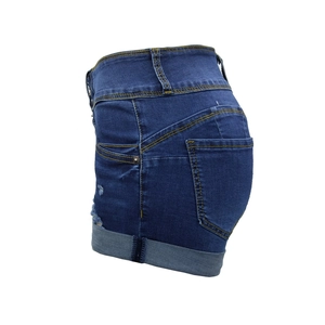 Detail of high waisted dark blue denim shorts with cuffed hem and contrast yellow stitching