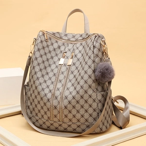Chic women's multi-way monogram backpack with vintage geometric print and plush charm