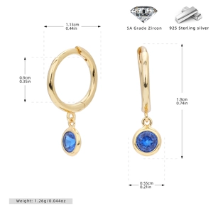 Detail view of gold S925 silver hoop earrings with a blue gemstone charm and measurements