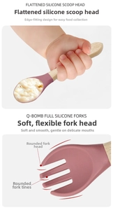 Detail of baby silicone spoon and fork set with safe rounded edges and wooden handles