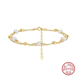Close-up of S925 sterling silver stamp on golden pearl double-layer bracelet