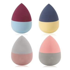 Set of four teardrop dual-color makeup sponges for wet and dry cosmetic application