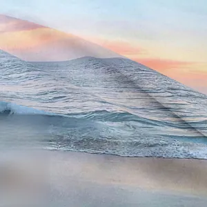 Close-up of lightweight semi-transparent fabric showing sea waves and sunset print details