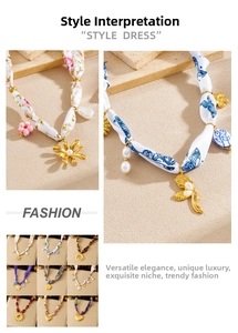 Close-up of assorted floral and leopard print fabric ribbon necklaces with gold pendants