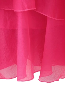 Detailed close-up of rose pink chiffon layered hem with precision stitching