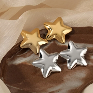 Minimalist 3D star stud earrings in gold and silver finish with high polished surface