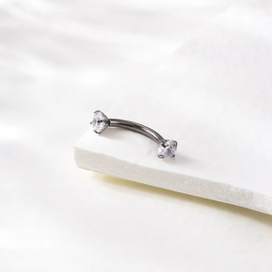 G23 titanium curved piercing with 3mm black finish and round clear zircon stones
