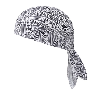 Detail of stretchable bandana cap featuring black and white wave patterns for sports