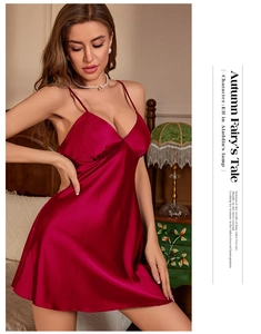 Detail of burgundy silk satin slip dress with deep V-neck and delicate straps