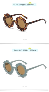 Detail view of flower-shaped kids sunglasses in hawksbill and light green colors
