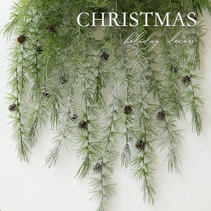 Artificial Christmas hanging pine branch with pine cones and white frost decor