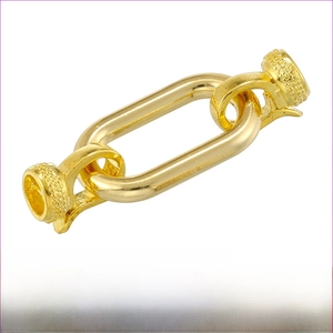 Detail of gold brass oval connector link for necklaces showing 14mm by 40mm dimensions