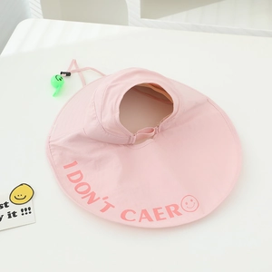Detail of pink open top sun hat showing the wide brim and letter print for kids