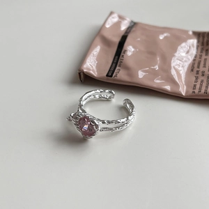 Detailed macro view of S925 silver lava texture ring with pink heart-shaped gemstone