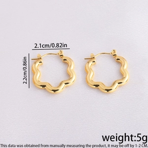 Detail showing gold floral hoop earrings with 2.1cm diameter and 5g weight specifications