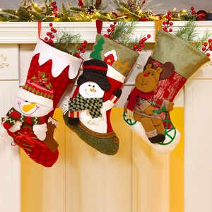 Three-piece set of hanging Christmas stockings with snowman and reindeer for holiday decor