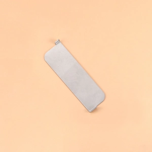 Close-up of a silver stainless steel charm bracelet tool with rectangular link connectors