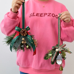 Handcrafted Christmas Santa pendants with pine cones, pine needles and festive ribbons