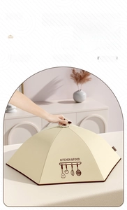 Detail of a foldable insulated food cover with steel frame and elegant kitchen print