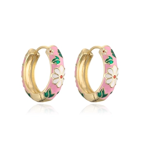 Detail of 18K gold-plated hoops with pink enamel and white flower patterns