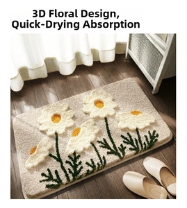 Detail of 3D tufted green floral bath mat showing plush fiber and absorbent texture