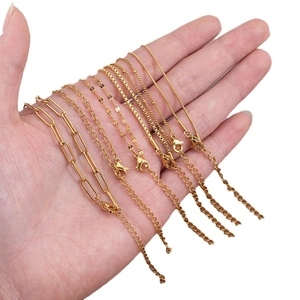 Set of six adjustable gold titanium steel necklaces with lobster clasps and extension chains