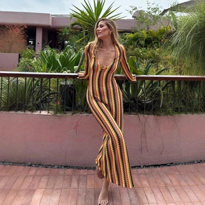 Slim fit long sleeve chevron knit jumpsuit with deep V-neck and flared leg for women