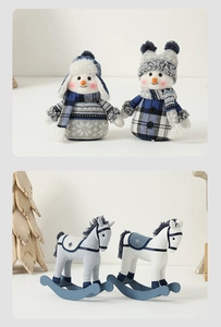 Detailed view of Mediterranean blue and white cloth snowmen and fabric rocking horse decor
