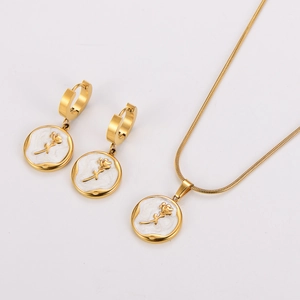 Elegant gold stainless steel jewelry set featuring white shell and rose pendant necklace