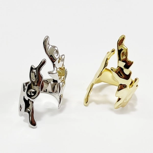 Artistic liquid metal style flame open rings in silver and gold finishes on white