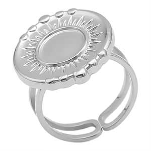 Macro shot of silver adjustable ring with sunburst engraved disc and dual-track band
