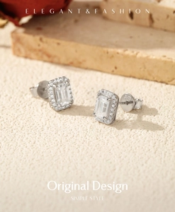 Close-up of S925 sterling silver emerald cut earrings with halo setting and hallmark