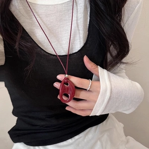 Minimalist red resin geometric oval pendant necklace with elegant cord for modern women