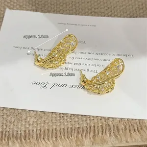 French vintage gold hollow teardrop earrings with crystals and silver needle studs