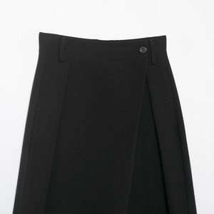 Women's black asymmetrical waist leisure pants with double-breasted button details