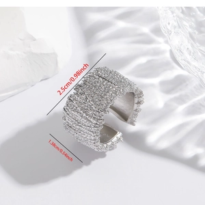 Detail shot of silver irregular woven textured open ring with 2.5cm and 1.38cm size specs