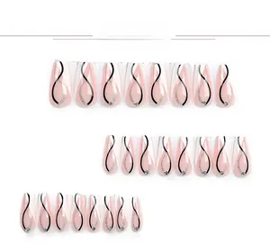 Detail of 24pcs pink coffin press-on nails with silver glitter lines and rhinestones