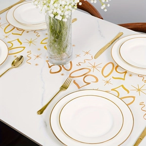 Detail of 50th anniversary white marble table runner with gold star and number patterns