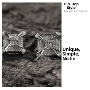 Macro detail of hip-hop silver square stud earring with dragon claw setting and cubic zirconia