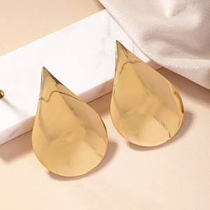 Elegant gold teardrop earrings with a brushed metal finish in an artistic marble setting