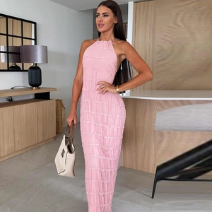 Close-up of pink halter maxi dress featuring unique layered textured ruffle fabric