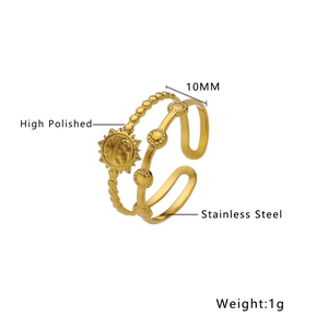Detailed macro view of 18k gold plated stainless steel double layer sun pattern open ring